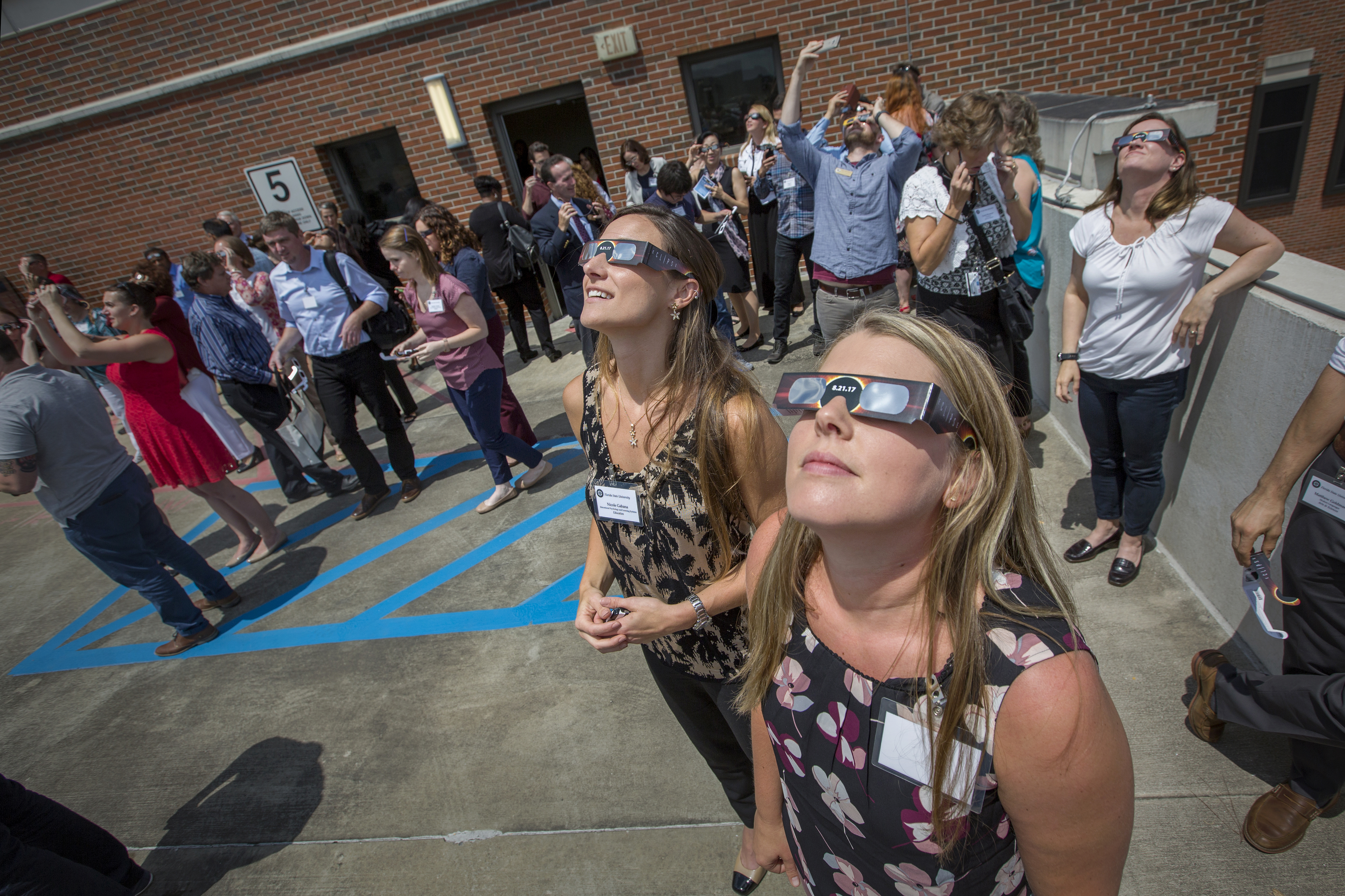 Photo of faculty viewing the eclipse