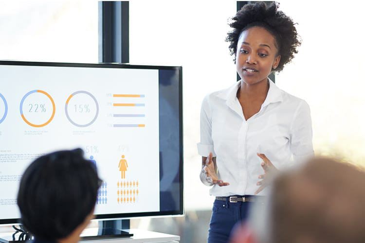 woman of color giving presentation